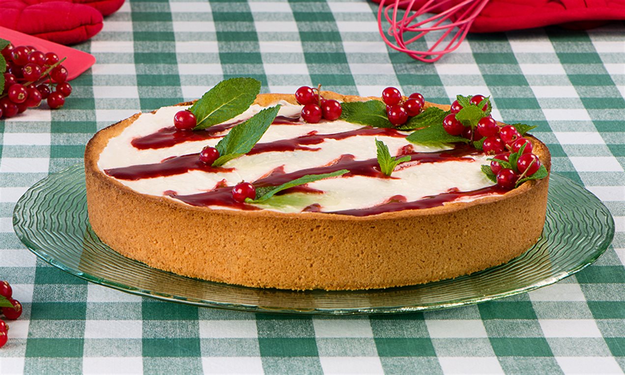 Cheesecake tricolore con guarnizione alla fragola
