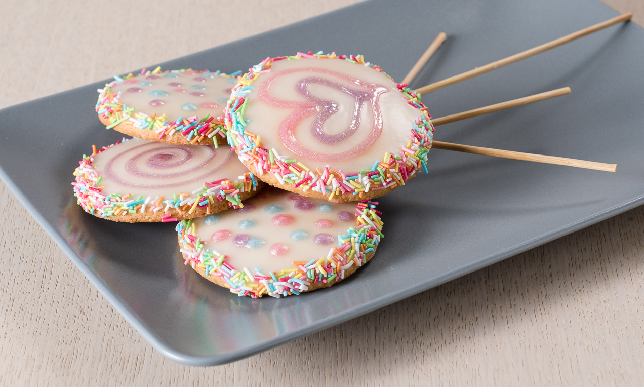 Biscotti decorati a forma di lecca-lecca