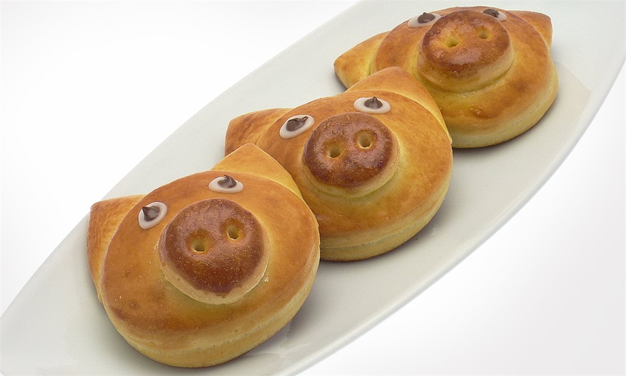 Panini dolci a forma di maialino con crema alla nocciola
